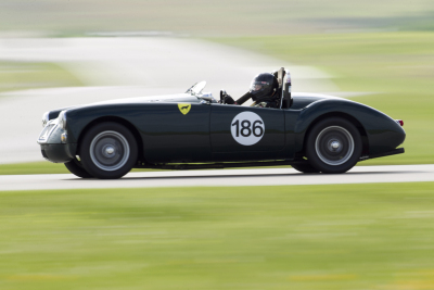 Lou Marchant at speed in her MGA
