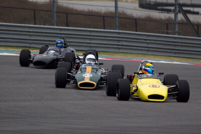Matt Brabham yellow with Geoff Brabham green followed by Tonis Kasemets through Turn 1 at COTA 2020