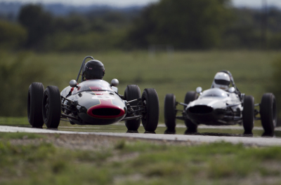 6 Bruce Revennaugh in his Lotus 22 and 4 Robert Hoemke in his 1962 Cooper T59 Formula Junior put on a show